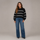 Suéter tricot feminino listrado grosso nas cores preto e off-white Anabeaz, modelagem com ombros caídos.
Suéter Listrado, Tricot Grosso Feminino, Blusa de Frio Listrada, Suéter Quiet Luxury, Tricô Old Money, Blusa Tricot Encorpada, Suéter Preto e Branco, Anabeaz, Moda Inverno 2026, Tricot Geométrico Premium Anabeaz
